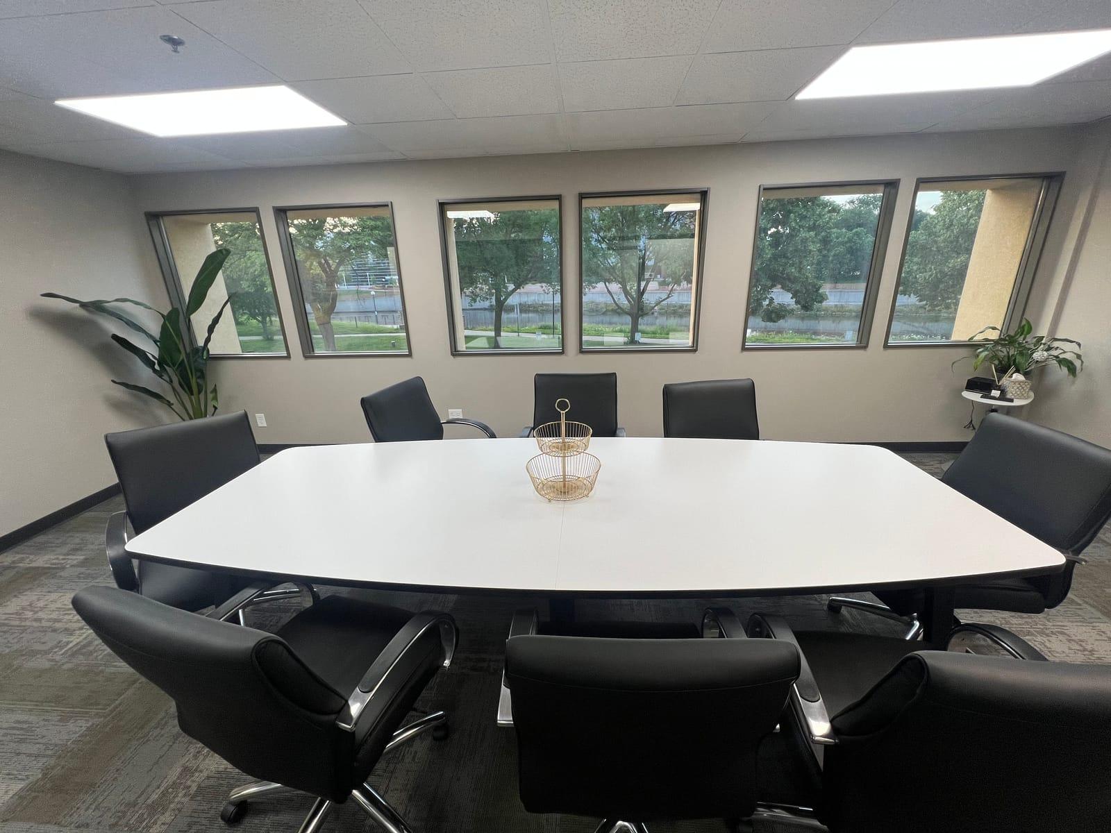 The Ironwood boardroom with a large conference table and floor-to-ceiling windows