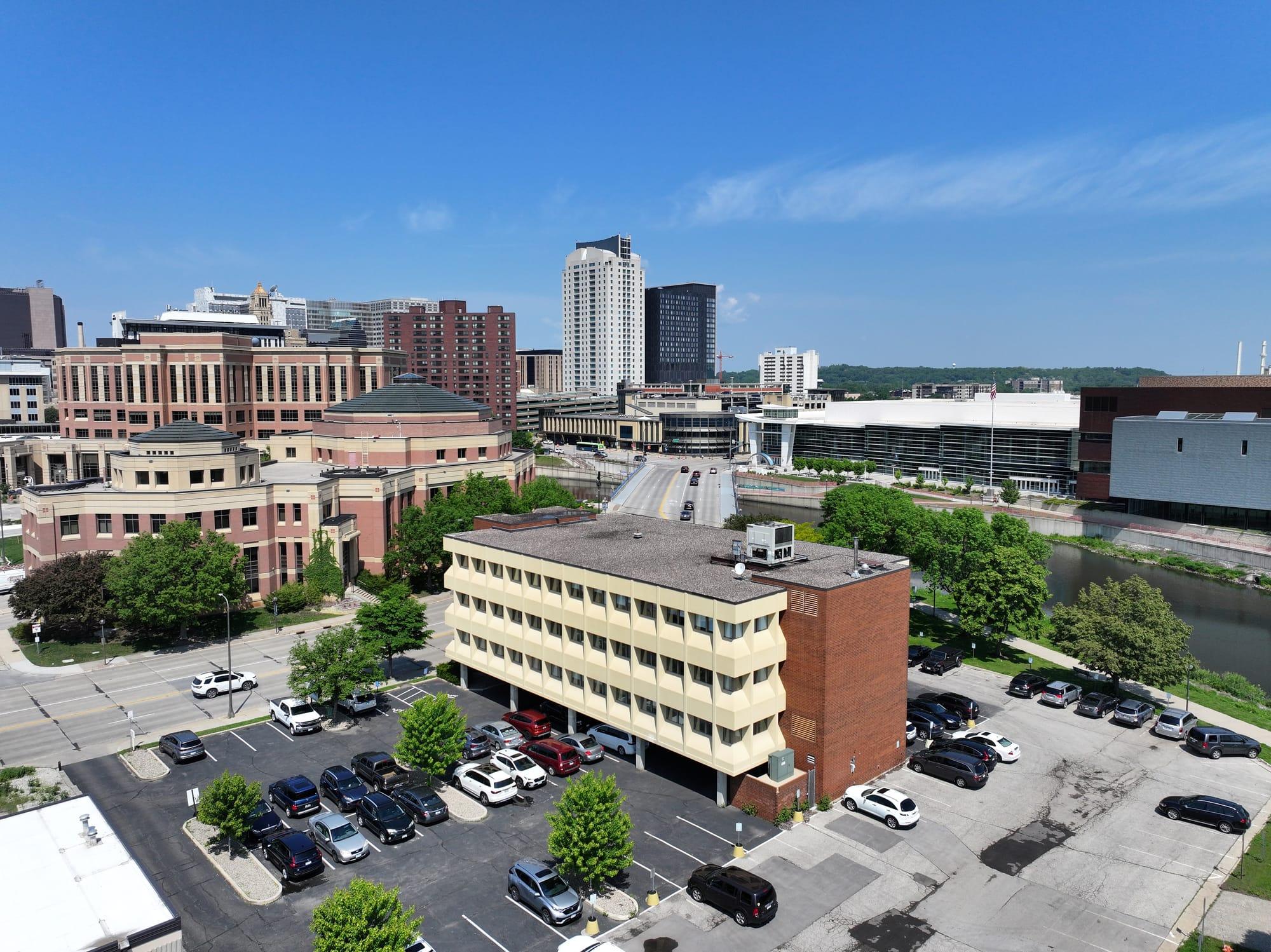 Aerial view of Ironwood Square with the downtown Rochester skyline behind it